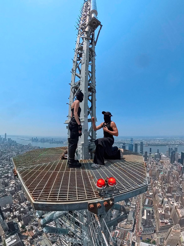 Empire State Building Daredevils Expose Security Lapse After Scaling 1,454-Foot Antenna To Hang "Cringe" Flag