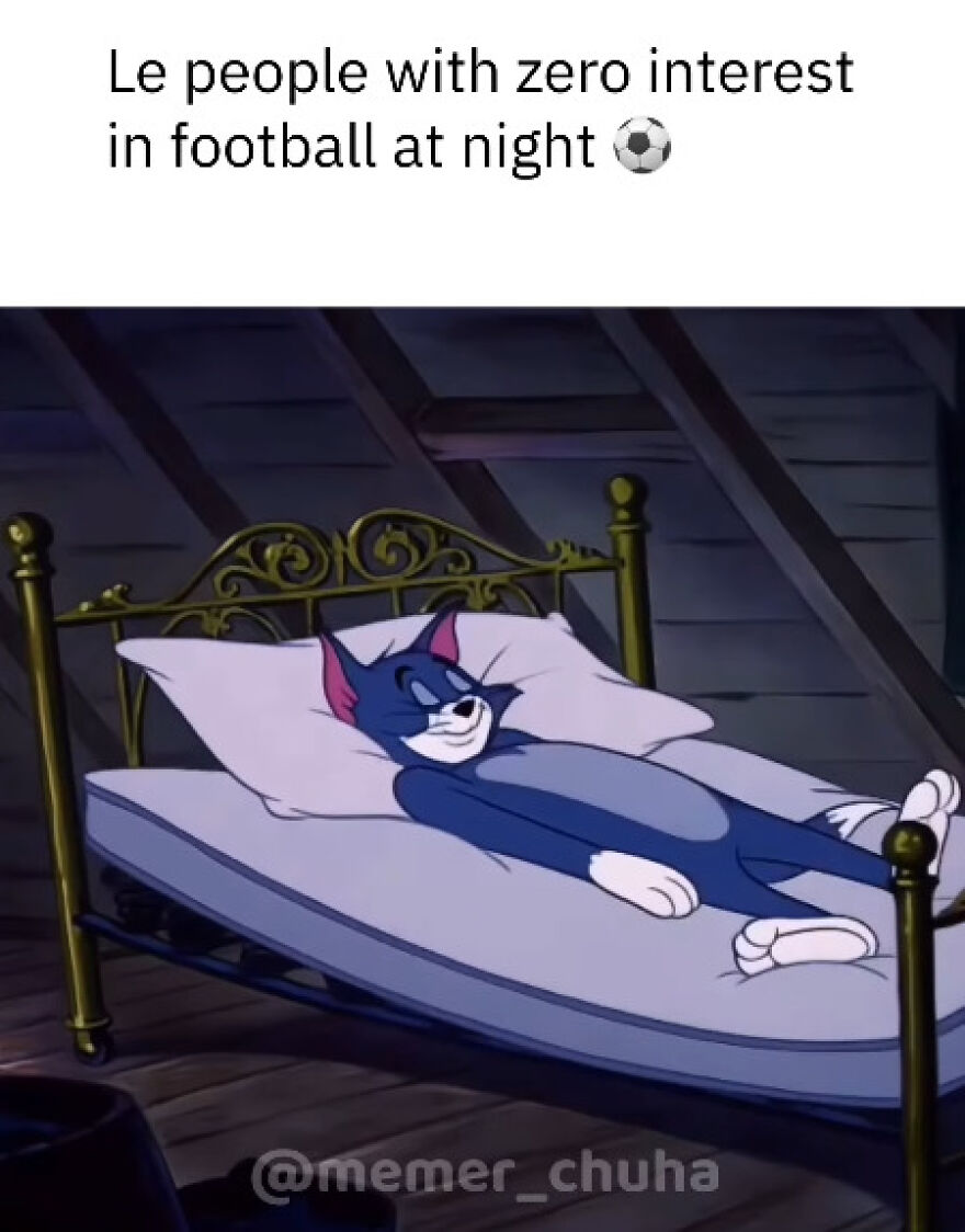 A World Cup meme showing Tom from Tom and Jerry relaxing in bed, representing people with zero interest in football at night.