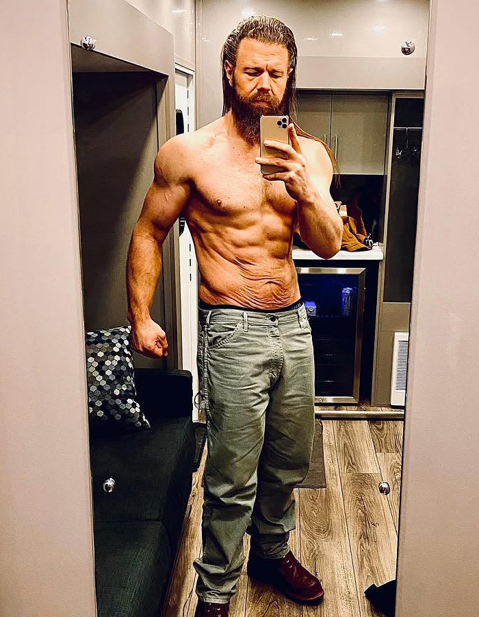 Lead actor selfie, showing his physique in a mirror after a major series on-set accident. Lead actor selfie, showing his physique in a mirror after a major series on-set accident.