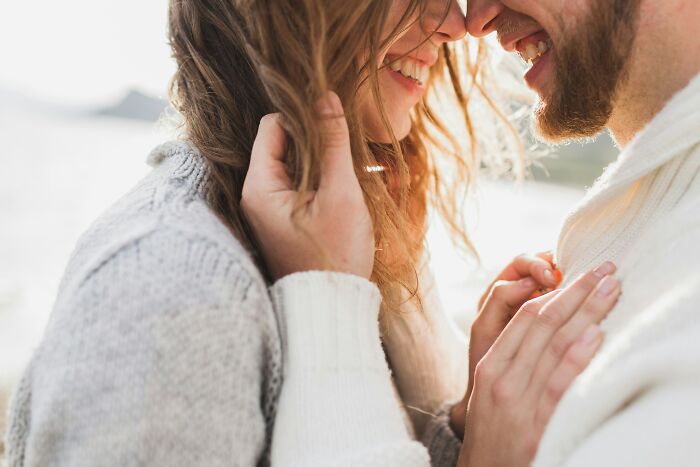 A happy couple embracing, representing the realities of being married.
