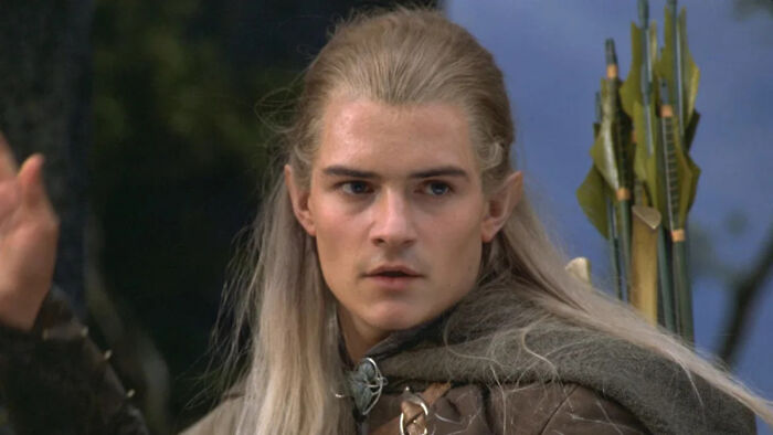 Hollywood Star in a $3 Billion Franchise; a close-up of an actor with long blonde hair and pointed ears.