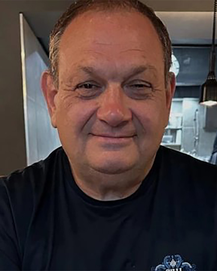 A man smiling, involved in an incident where a famous model was left fighting for her life. A man smiling, involved in an incident where a famous model was left fighting for her life.