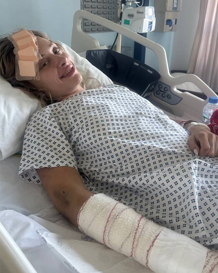 A famous model smiles in a hospital bed with bandages, recovering from a party where men left her fighting for life. A famous model smiles in a hospital bed with bandages, recovering from a party where men left her fighting for life.