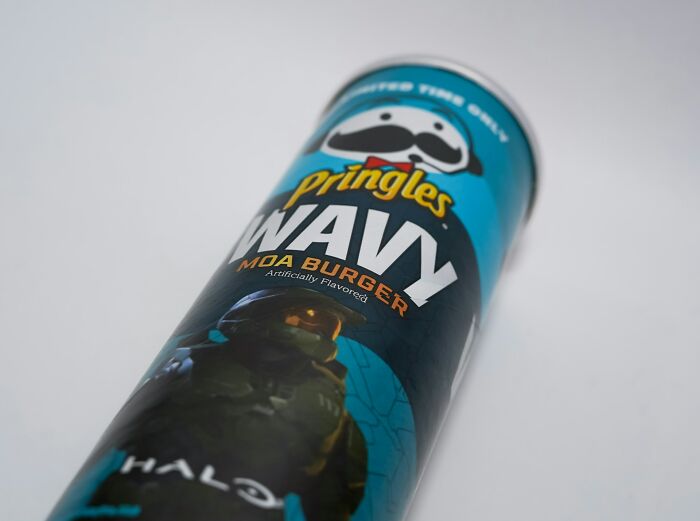 A disturbing Pringles Wavy MOA Burger can featuring Halo, a scary video game character.