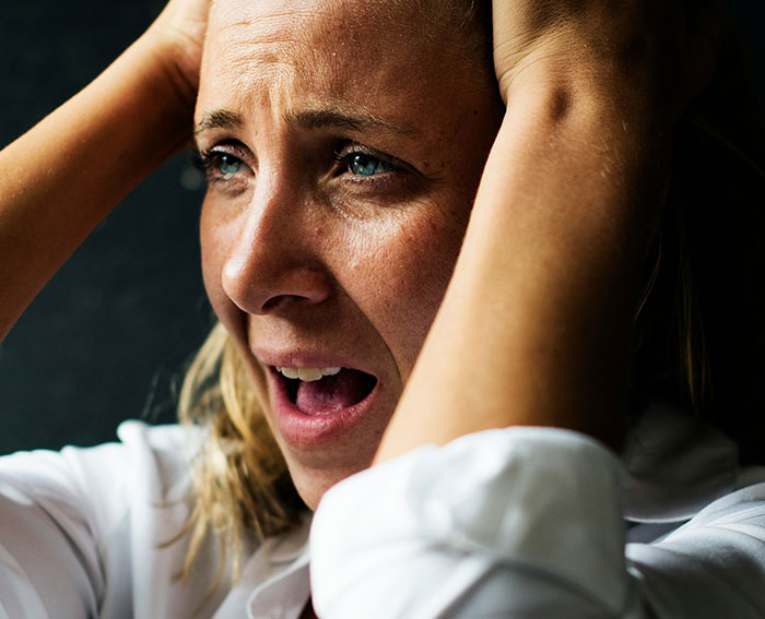 A new mom, feeling betrayed, holds her head as her MIL forces her way into the delivery room while her husband stands by. A new mom, feeling betrayed, holds her head as her MIL forces her way into the delivery room while her husband stands by.