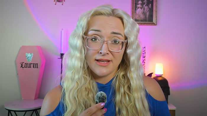 Mortician Lauren standing in a room, revealing 5 things she never wants to do in life.