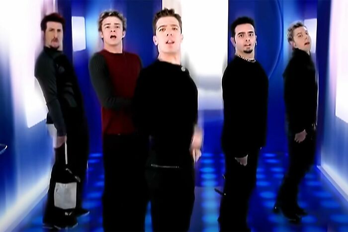 A boy band performing, potentially disillusioning some fans. Famous celebrities performing.