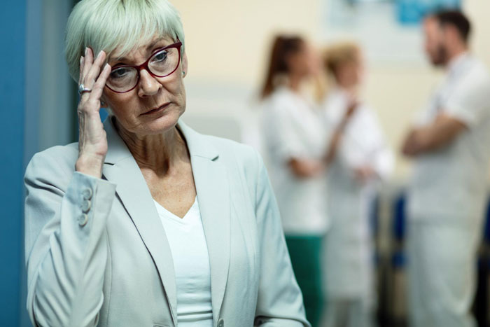 An angry Mom, with hand on her forehead, has a hissy fit during DIL's delivery, told to stop by her son.