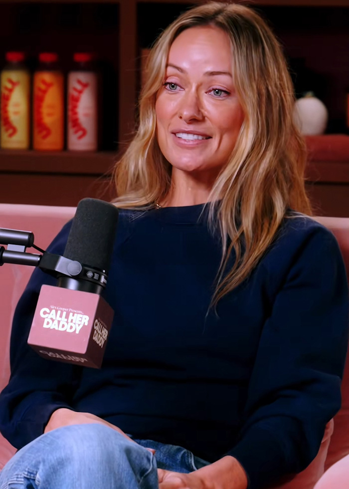 Olivia Wilde on Call Her Daddy, looking concerned and showing her dramatically slimmer frame. Olivia Wilde on Call Her Daddy, looking concerned and showing her dramatically slimmer frame.