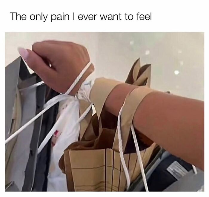 A hand tied with shopping bag strings, representing the desire for shopping pain in a relatable meme.