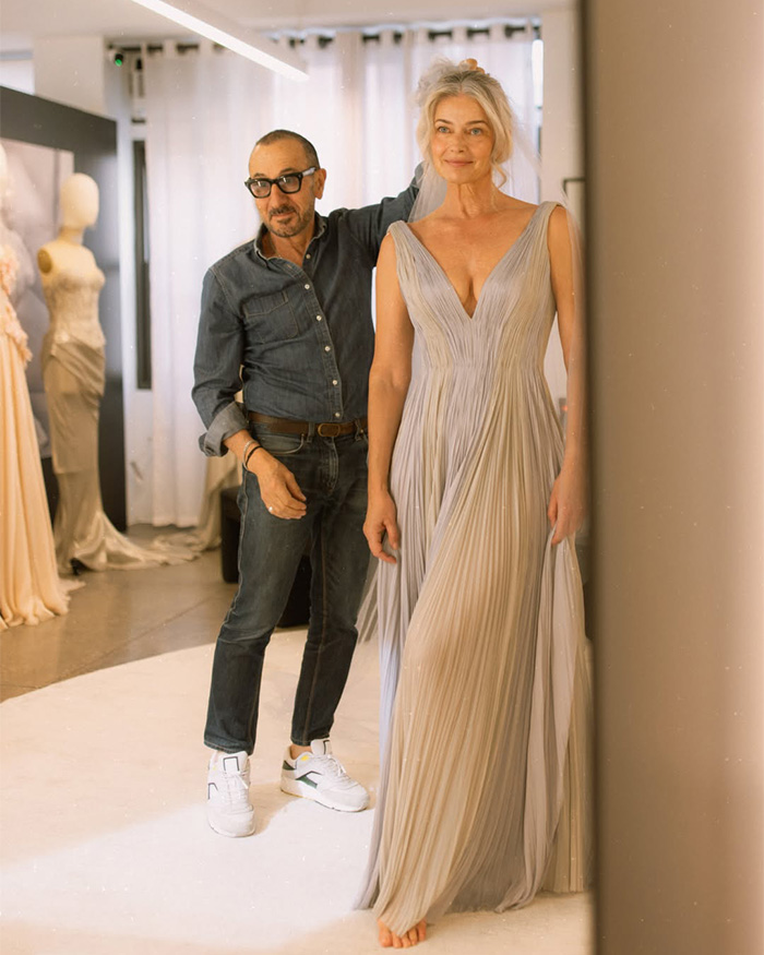 Model getting married at 61 during a dress fitting, wedding photos going viral as she's praised for aging.