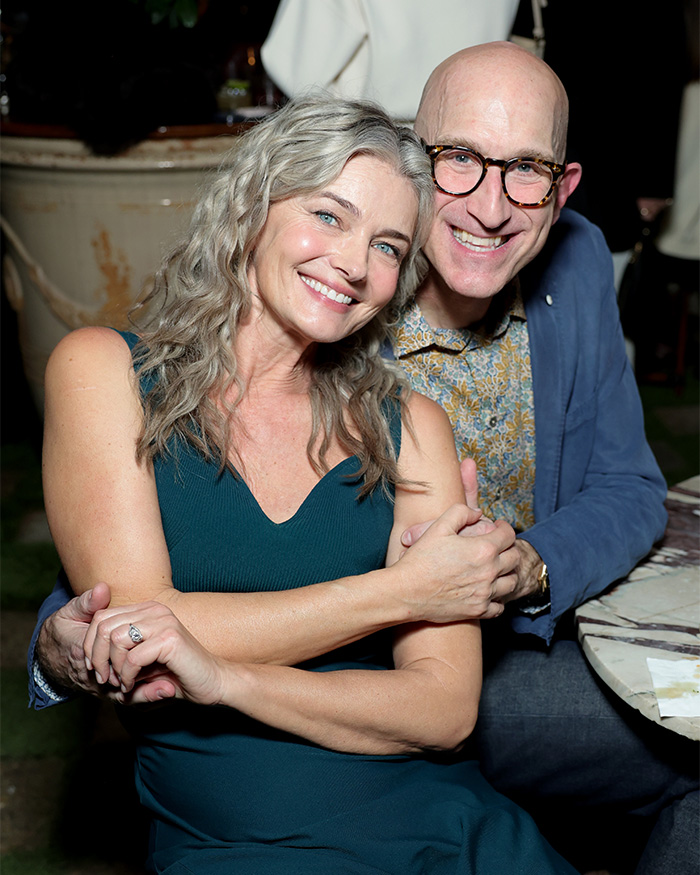Paulina Porizkova, a model, and her husband smiling at their wedding. The model gets married at 61.
