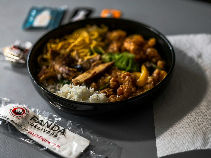 A close-up of a Panda Express bowl, stories about MILs.