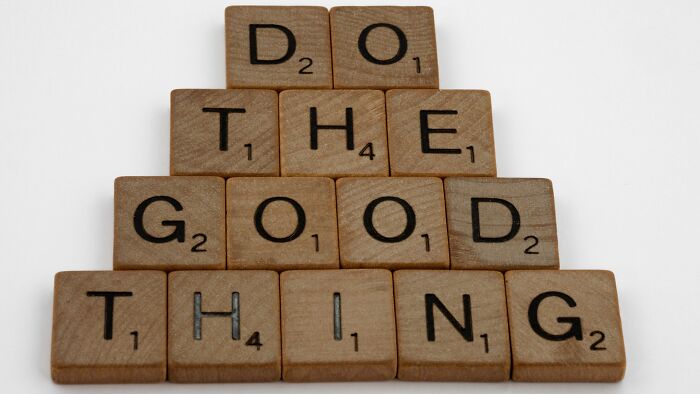 Scrabble tiles spelling out DO THE GOOD THING, representing the challenge to identify TV shows.
