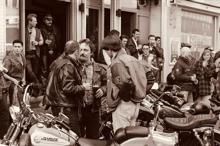 A group of bikers gathered outside, some with drinks in hand, creating a terrifying moment.