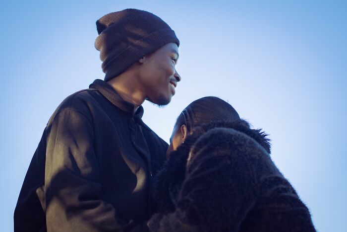 A couple looking away from each other, subtle signs someone isn't as nice as they pretend to be.
