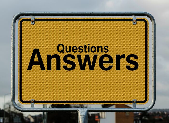 A yellow sign with the words Questions and Answers, representing a quiz about brain questions and answers. A yellow sign with the words Questions and Answers, representing a quiz about brain questions and answers.