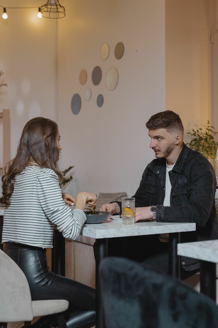 A couple at a cafe, having a conversation about why women changed minds about guys they once thought were perfect.