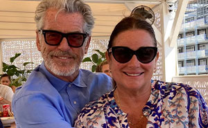 Cruel Trolls Go After Pierce Brosnan's Wife Online, He Elegantly Shuts Down Every One Of Them