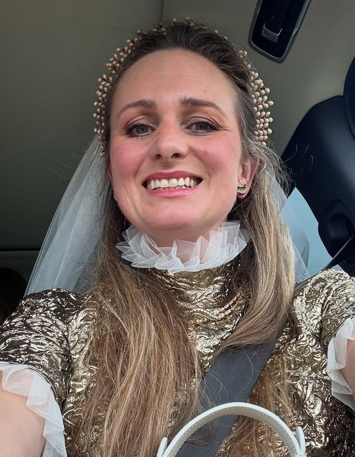 Woman in golden dress and wedding veil, smiling brightly, who was Prince William's decoy girlfriend and just had her fairytale wedding. Woman in golden dress and wedding veil, smiling brightly, who was Prince William's decoy girlfriend and just had her fairytale wedding.