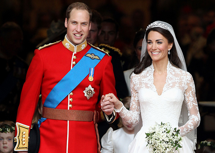 Prince William and Kate holding hands after their fairytale wedding. Prince William and Kate holding hands after their fairytale wedding.