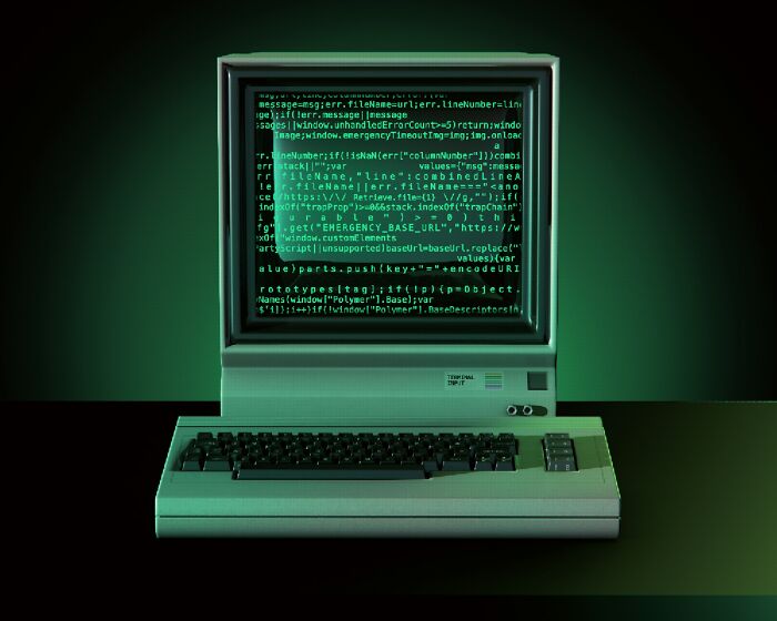 A vintage computer displaying green code on its screen, illustrating one of the internet's creepy unsolved mysteries.