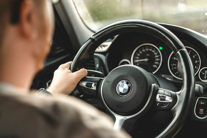 A person driving a car, a disturbing public witness experience.