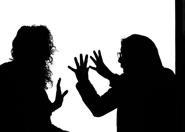 Silhouetted figures depicting a bizarre remark or conflict, exposing the truth of a slain track star. Silhouetted figures depicting a bizarre remark or conflict, exposing the truth of a slain track star.