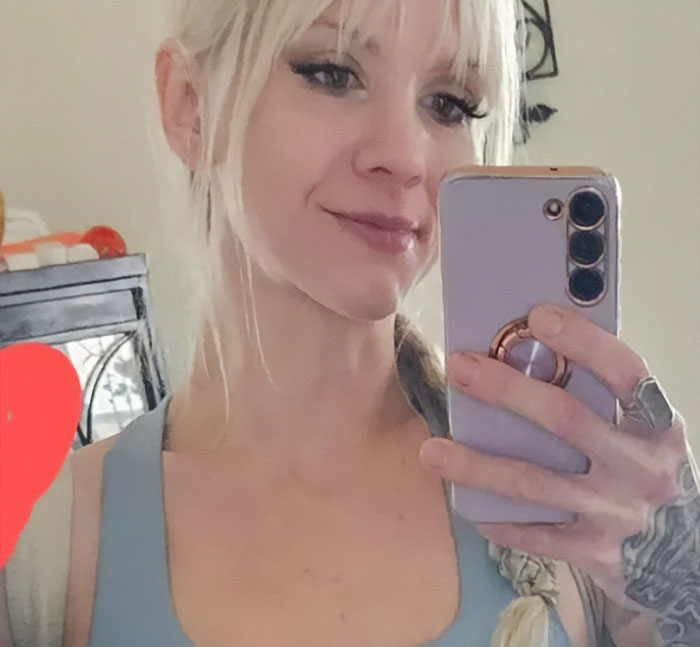 A White Minnesota mom takes a selfie, facing consequences for her racial slur at a Black autistic child. A White Minnesota mom takes a selfie, facing consequences for her racial slur at a Black autistic child.