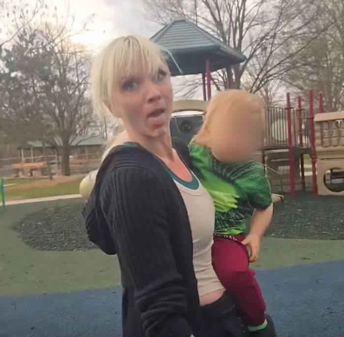 Image of a Minnesota mom on a playground, involved in an incident with a racial slur against a Black autistic child. Image of a Minnesota mom on a playground, involved in an incident with a racial slur against a Black autistic child.