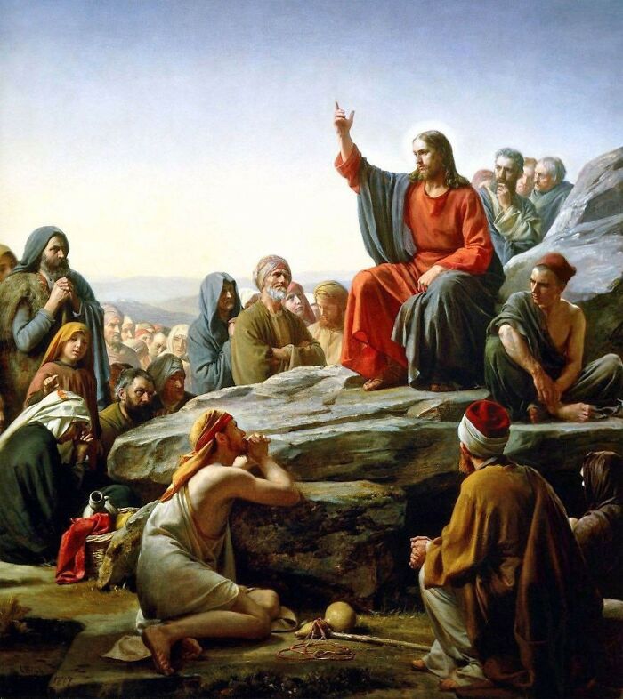 A painting of Jesus delivering the Sermon on the Mount to a crowd, depicting a crucial history fact.