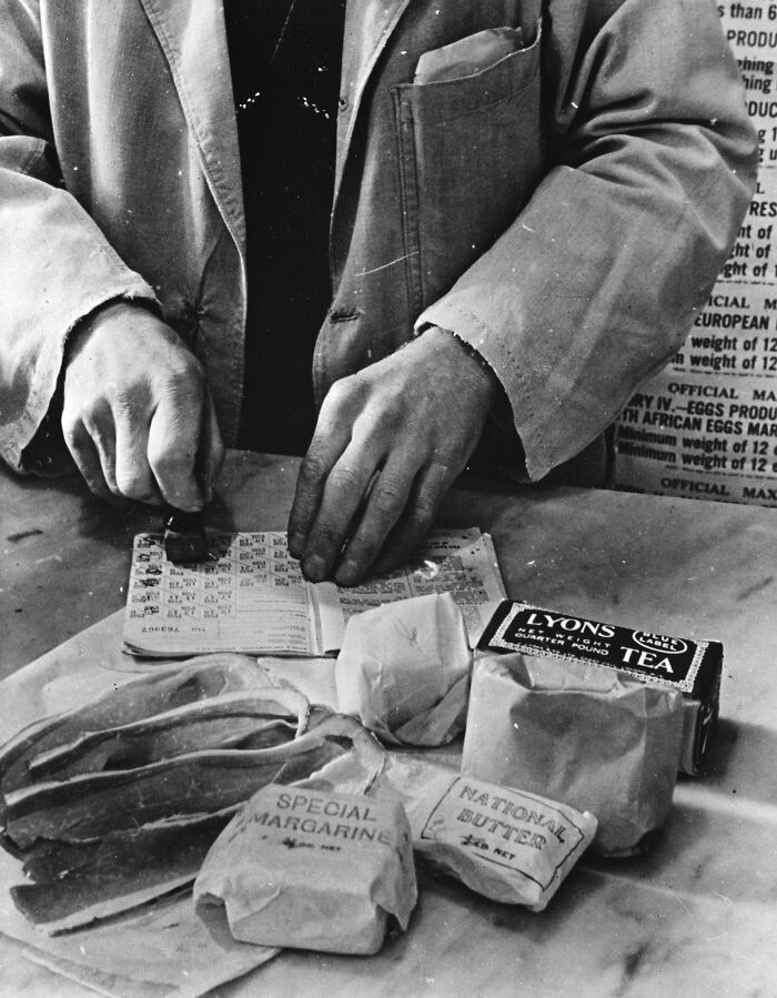 A person rationing food, showcasing a fascinating history fact about wartime rationing.