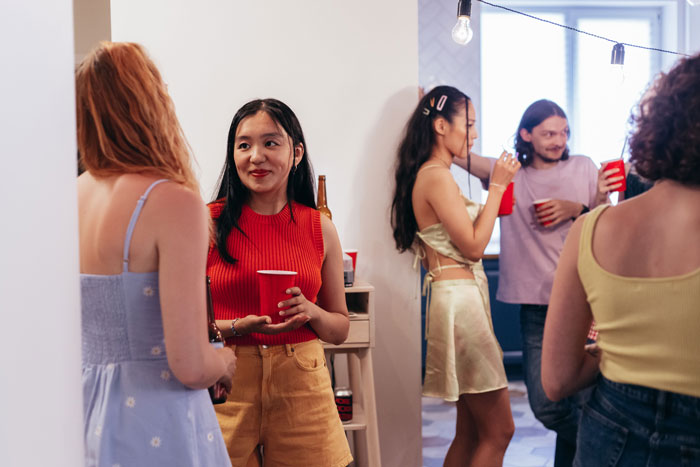 Group of young adults at a party, reflecting the teen's life outside of being a free sitter for her sister's kids and her 3rd pregnancy plan. Group of young adults at a party, reflecting the teen's life outside of being a free sitter for her sister's kids and her 3rd pregnancy plan.