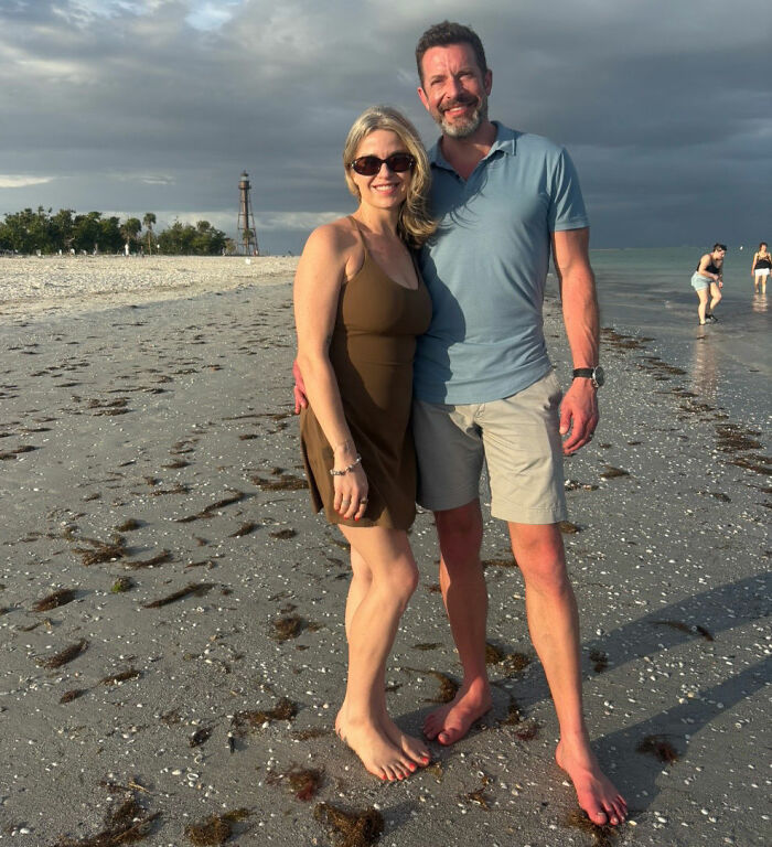 A Michigan man and his wife on a beach, related to Reddit posts and a family tragedy.