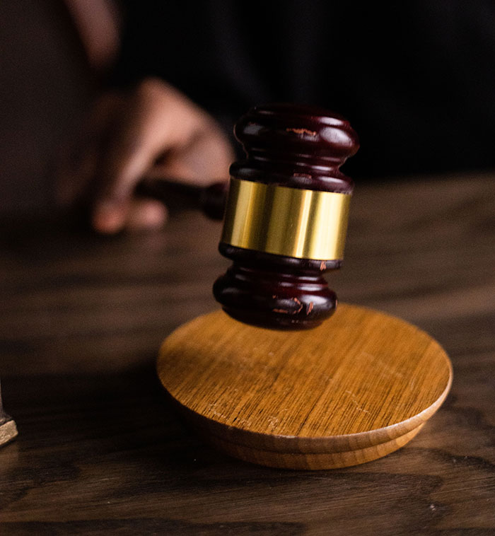 A judge's gavel on a wooden table, signifying justice served in instant karma divorce cases.