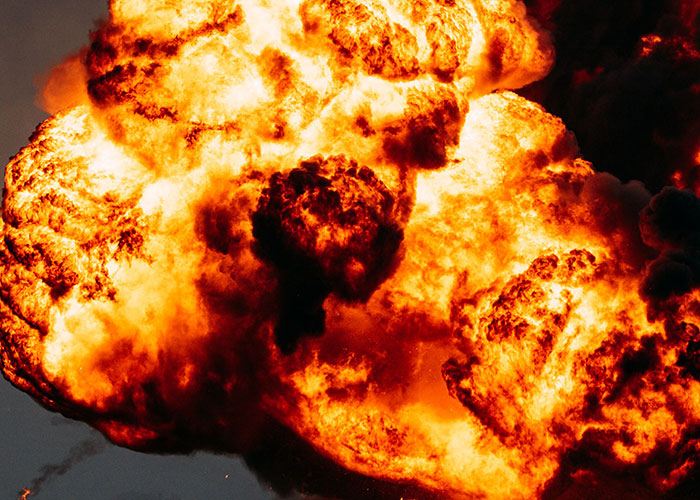 Large explosion with fire and smoke, a fact about the human body.