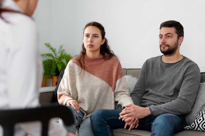 Couple attending therapy session to address love life communication