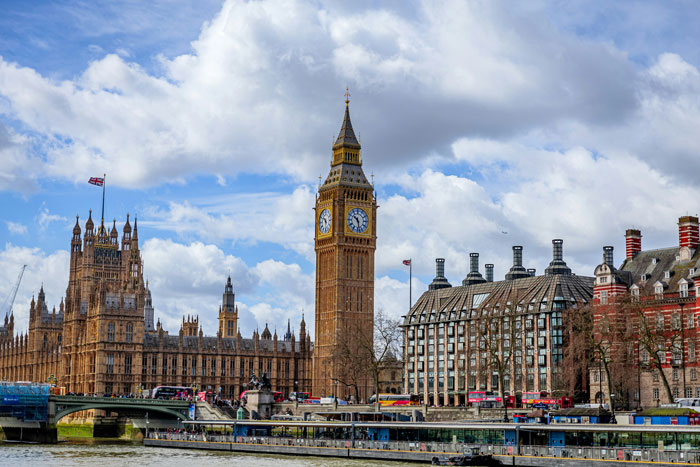 Big Ben and the Houses of Parliament in London, a country where working in the heat regulations vary.