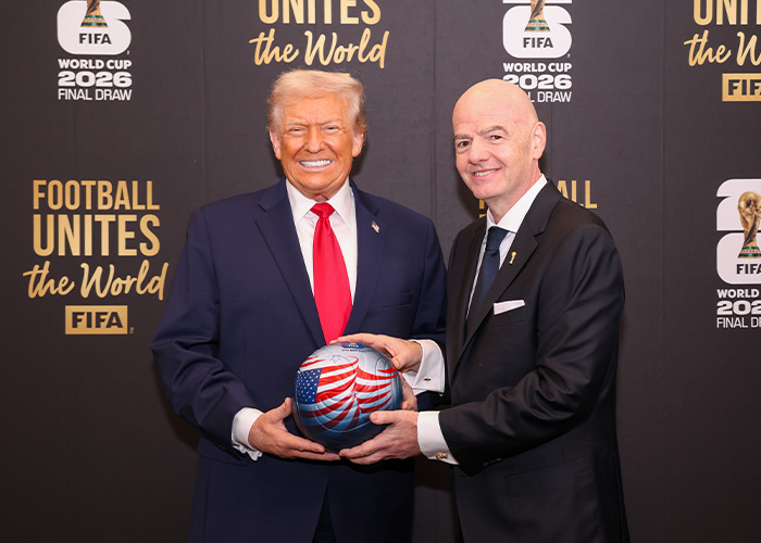 Donald Trump and another man holding a soccer ball. Trump is reportedly disrespecting the White House with bad habits, affecting Melania. Donald Trump and another man holding a soccer ball. Trump is reportedly disrespecting the White House with bad habits, affecting Melania.