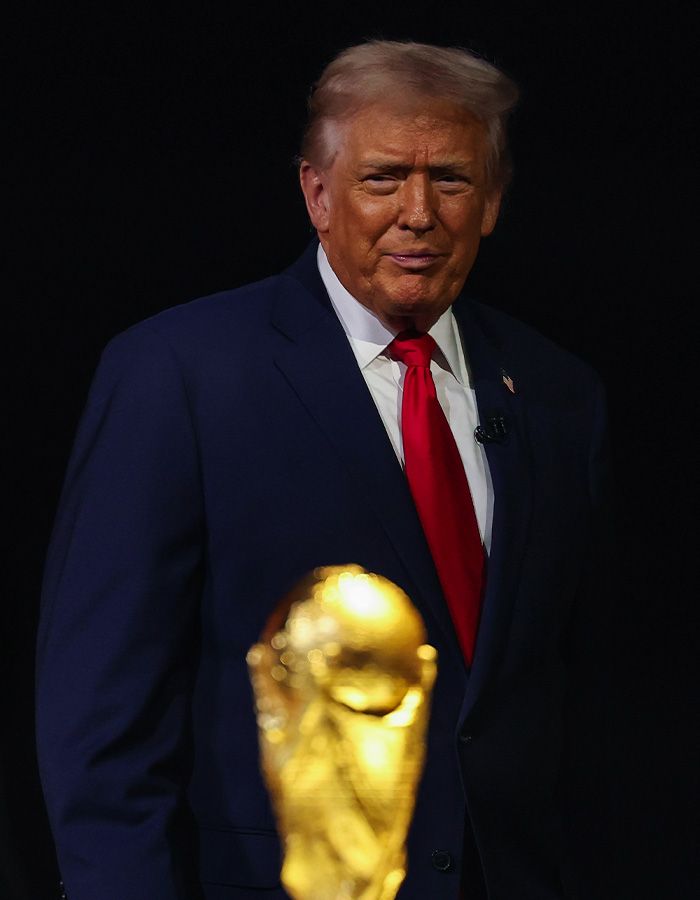 Donald Trump in a suit looking at the camera. Trump is disrespecting the White House with a bad habit, affecting Melania. Donald Trump in a suit looking at the camera. Trump is disrespecting the White House with a bad habit, affecting Melania.
