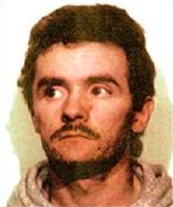 A somber mugshot of a man, associated with fear among women near Britain's railway stations.
