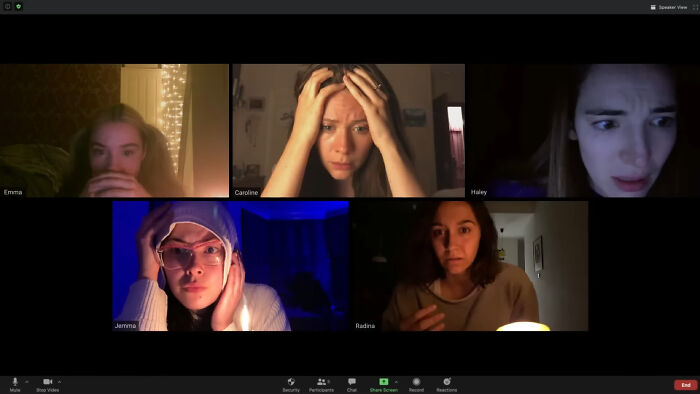 Five women on a video call looking horrified, reflecting the most terrifying horror movies.