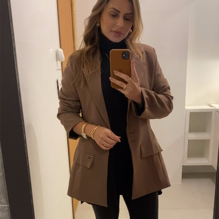 Woman in a mirror selfie, before a cosmetic procedure, showing her natural face before dramatic changes. Woman in a mirror selfie, before a cosmetic procedure, showing her natural face before dramatic changes.