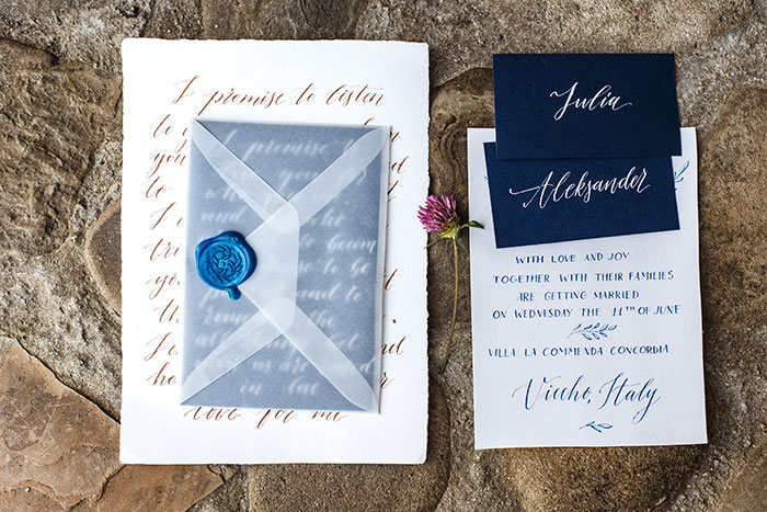 Elegant wedding invitations for a bride and groom, featuring navy blue and white calligraphy. Bride planning a wedding.