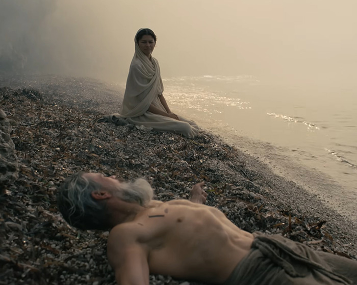Zendaya's latest look on a beach, sitting with a man lying on the sand, for the tiny detail. Zendaya's latest look on a beach, sitting with a man lying on the sand, for the tiny detail.