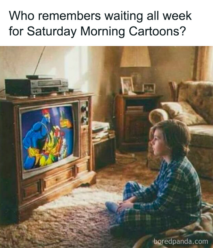A 90s kid in pajamas watching Saturday Morning Cartoons on a vintage TV, a nostalgic meme.