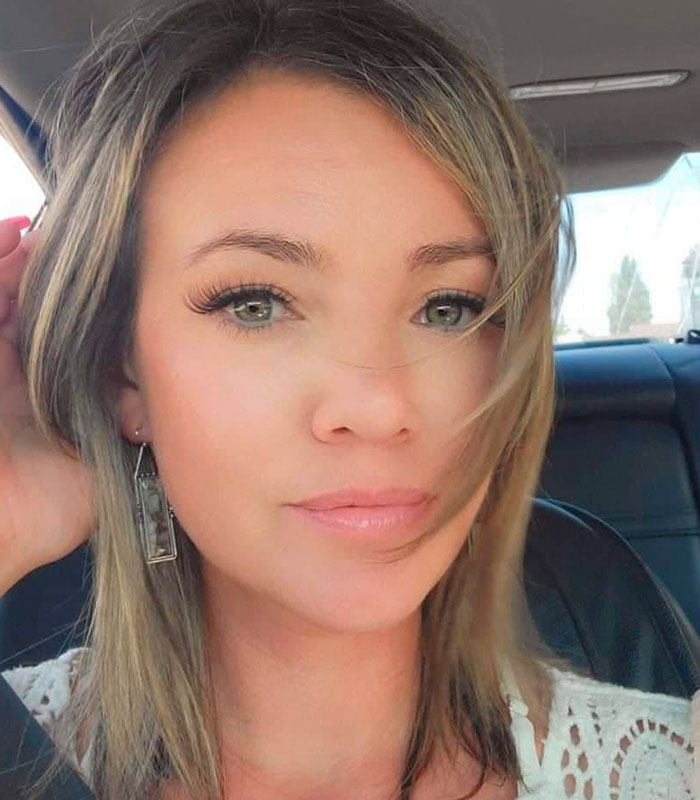 A mom-of-four who was attacked by spiders on a camping trip and is now fighting for her life in hospital.