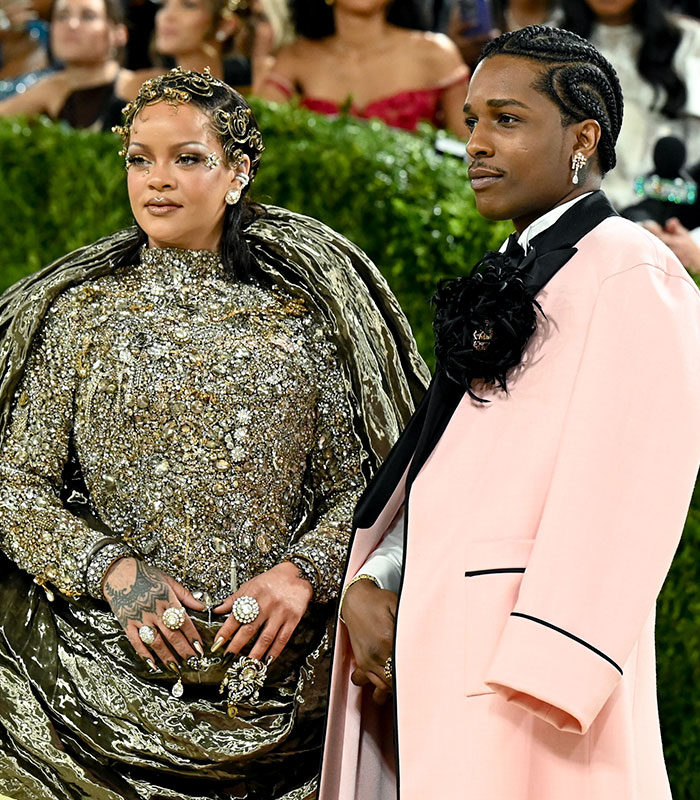 Rihanna and A$AP Rocky posing in elaborate outfits. The celebrity couple's video sparked uproar online. Rihanna and A$AP Rocky posing in elaborate outfits. The celebrity couple's video sparked uproar online.