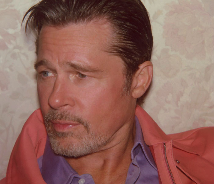 Brad Pitt closeup, serious expression, showing his approach to drinking and his sobriety streak. Brad Pitt closeup, serious expression, showing his approach to drinking and his sobriety streak.