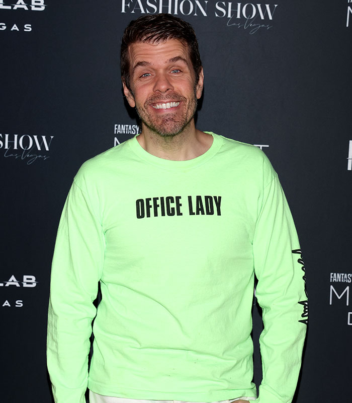 Perez Hilton smiling at an event, facing disfigurement and recovery after a disturbing livestream. Perez Hilton smiling at an event, facing disfigurement and recovery after a disturbing livestream.